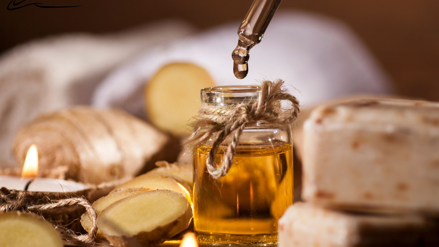 "Görselde şık bir cam şişeye hint yağı (castor oil) damlatılıyor."